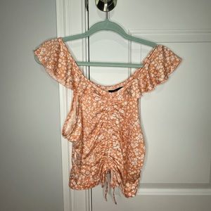 Off shoulder floral crop top
